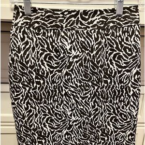 Cute skirt with lining; conservative slit in back; good condition; 00P